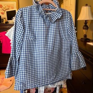 Ruffled neck top, zipper back.